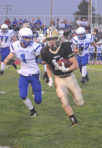 R-T Photo/Seth Herrold Travis Leeper outruns the Princeton defense and gets to the edge during the Bulldogs’ 61-12 win Friday night on homecoming at C.F. Russell Stadium. Leeper led all rushers in the game amassing 148 yards on just six carries.