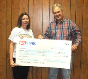 US Bank has made a $1,000 donation to the Grundy County Community Food Pantry for use in the Backpack Buddies food program. Pictured are, from left, Market Manager Kim Washburn and Food Pantry Board President Dennis Browning.