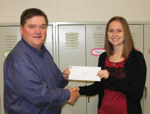 The GEC Community Foundation, Inc. awarded Trenton R-9 School District with a grant in the amount of $388.22 to purchase second grade books and CDs for the listening station. S.M. Rissler Elementary School second grade teacher Brooklyn Stevens, right, accepted the grant check from Foundation Trustee Dennis Gutshall.