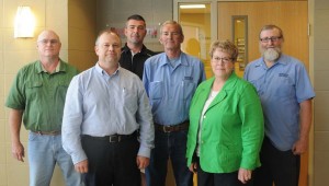 R-T Photo/Diane Lowrey Among NCMC faculty and staff recognized for 15 or more years of service to the college were, from left, front row, Allan Barnett, Linda Brown; back row, Dennis Sager, Steve Richman, John Campbell and Michael O’Neal.
