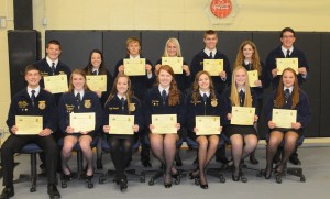 R-T Photo/Diane Lowrey Among FFA members receiving scholarships and awards during Friday night’s Trenton FFA Banquet were, from left, front row, Adam Kirby, Rebecca Tate, Emily Kasinger, Mariah Fox, Karli Crawford, Hannah Persell, Sadie Roy; back row, Logan Demsich, Jayden Roeder, Cade Darting, Jaylen Neff, Colton Neff, Molly Norman and Alex Davis.